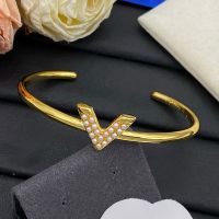 Louis Vuitton Essential V Cuff Bracelet in Metal with Pearls Gold